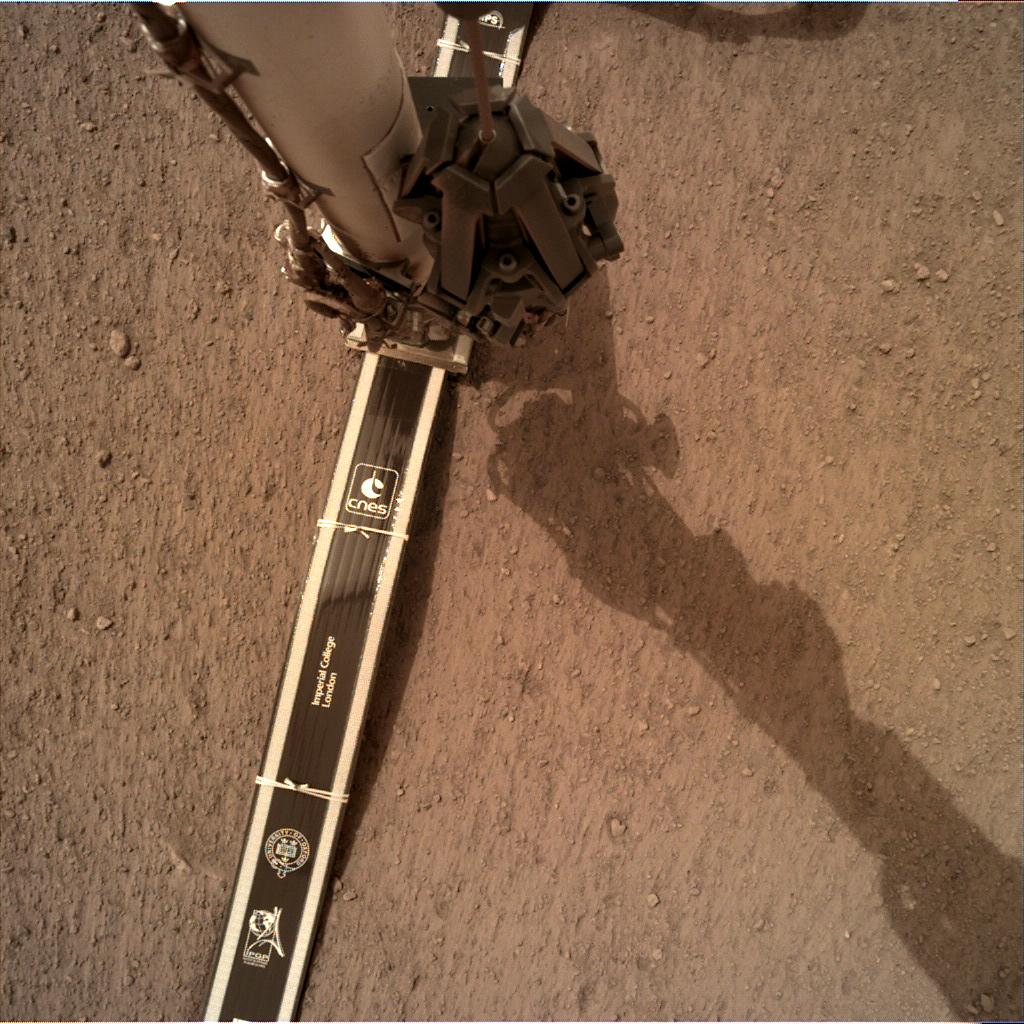 Nasa's Mars lander InSight acquired this image using its Instrument Deployment Camera on Sol 52
