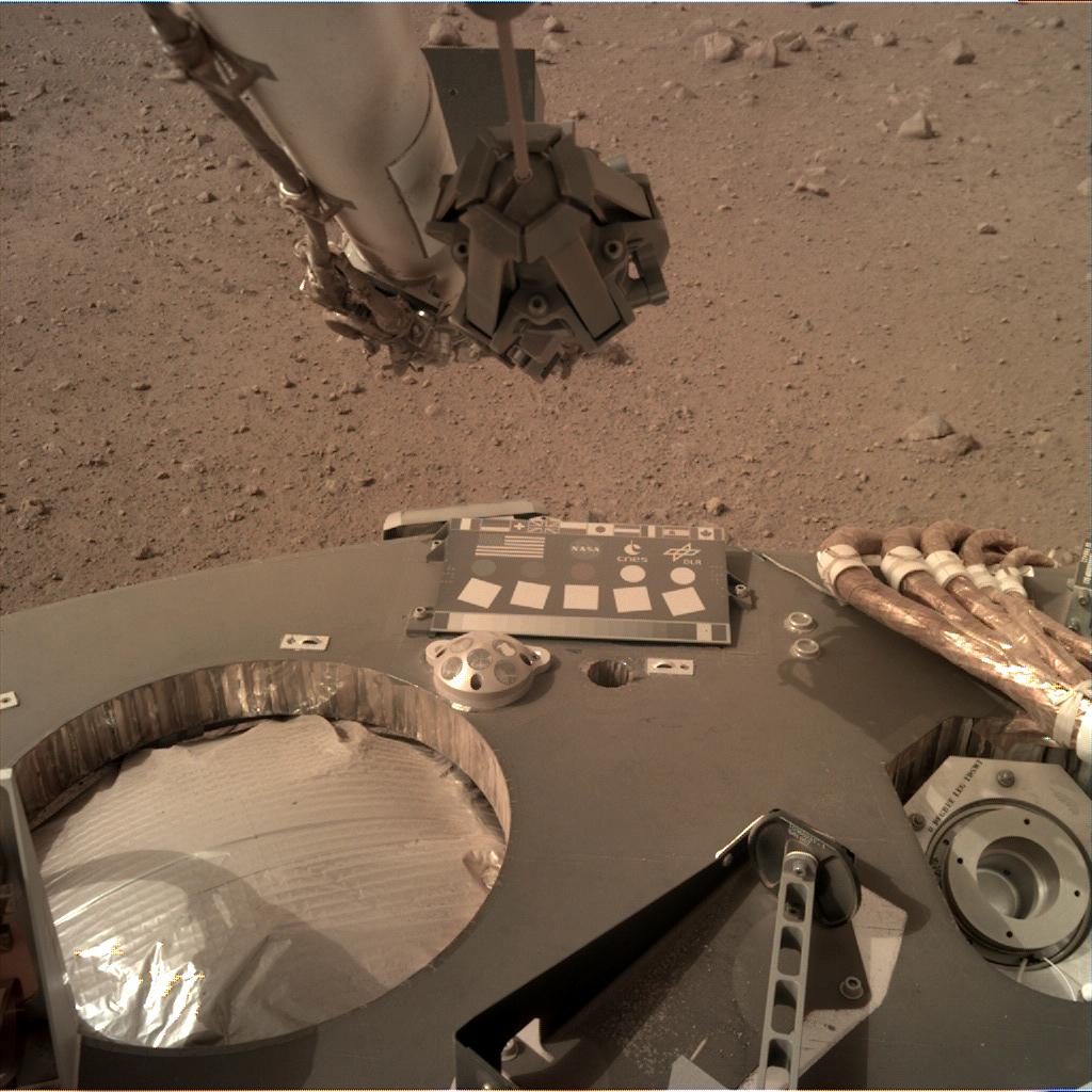 Nasa's Mars lander InSight acquired this image using its Instrument Deployment Camera on Sol 58