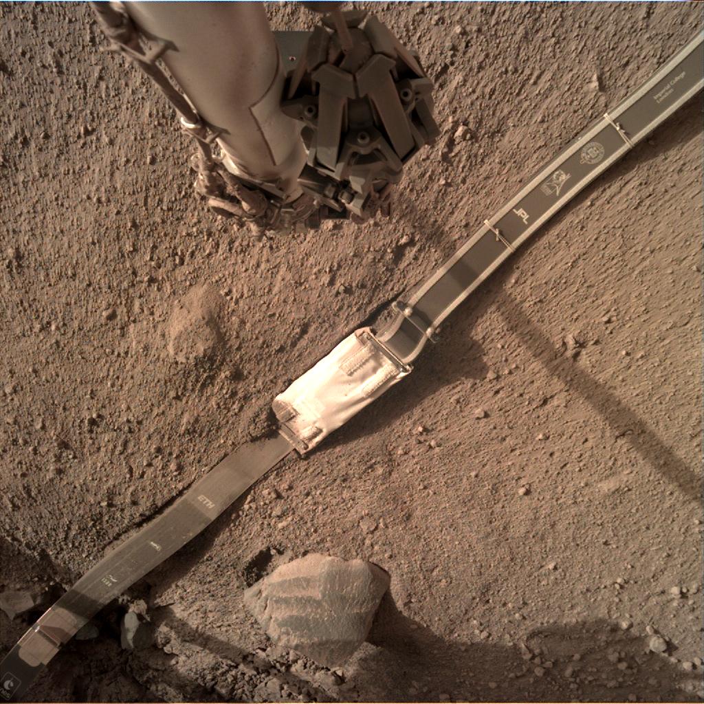 Nasa's Mars lander InSight acquired this image using its Instrument Deployment Camera on Sol 136