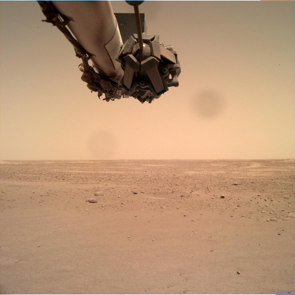 Nasa's Mars lander InSight acquired this image using its Instrument Deployment Camera on Sol 140