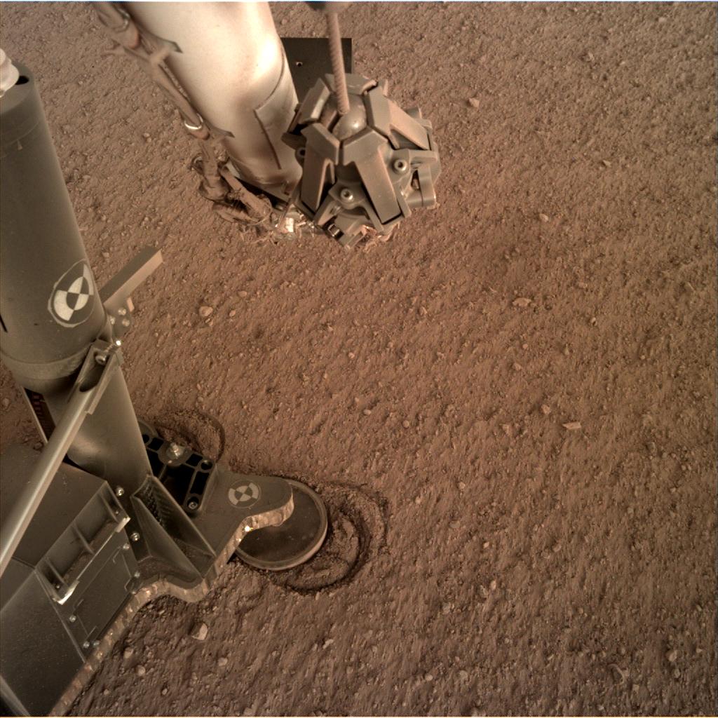 Nasa's Mars lander InSight acquired this image using its Instrument Deployment Camera on Sol 158
