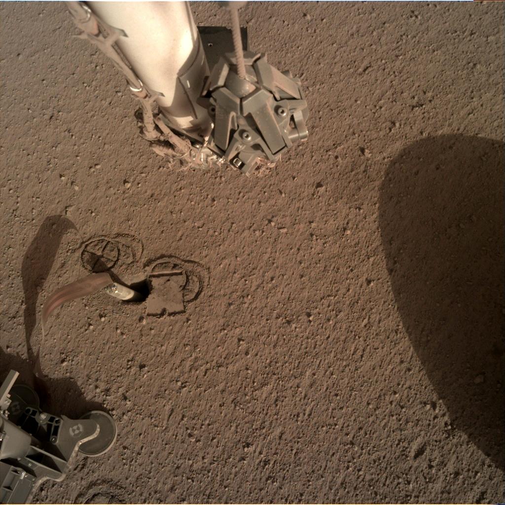 Nasa's Mars lander InSight acquired this image using its Instrument Deployment Camera on Sol 240