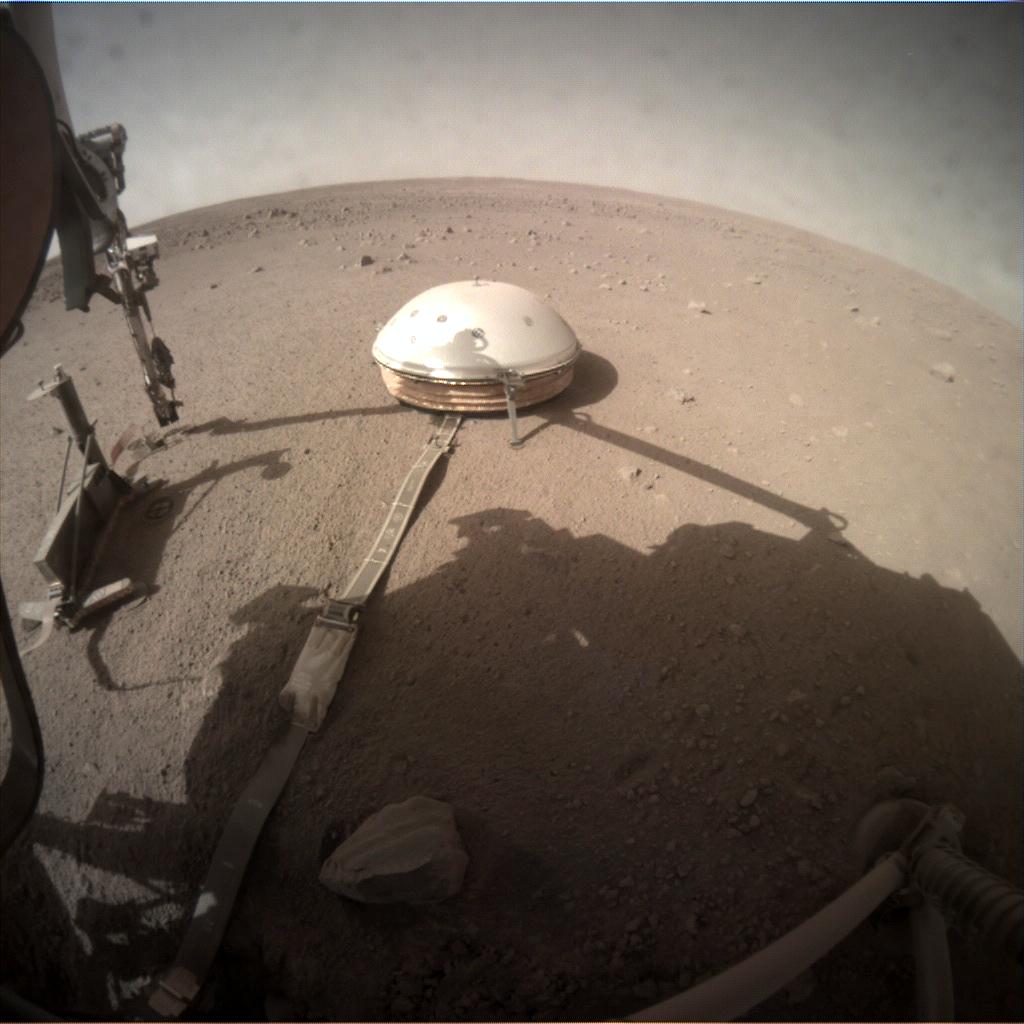 Nasa's Mars lander InSight acquired this image using its Instrument Context Camera on Sol 243