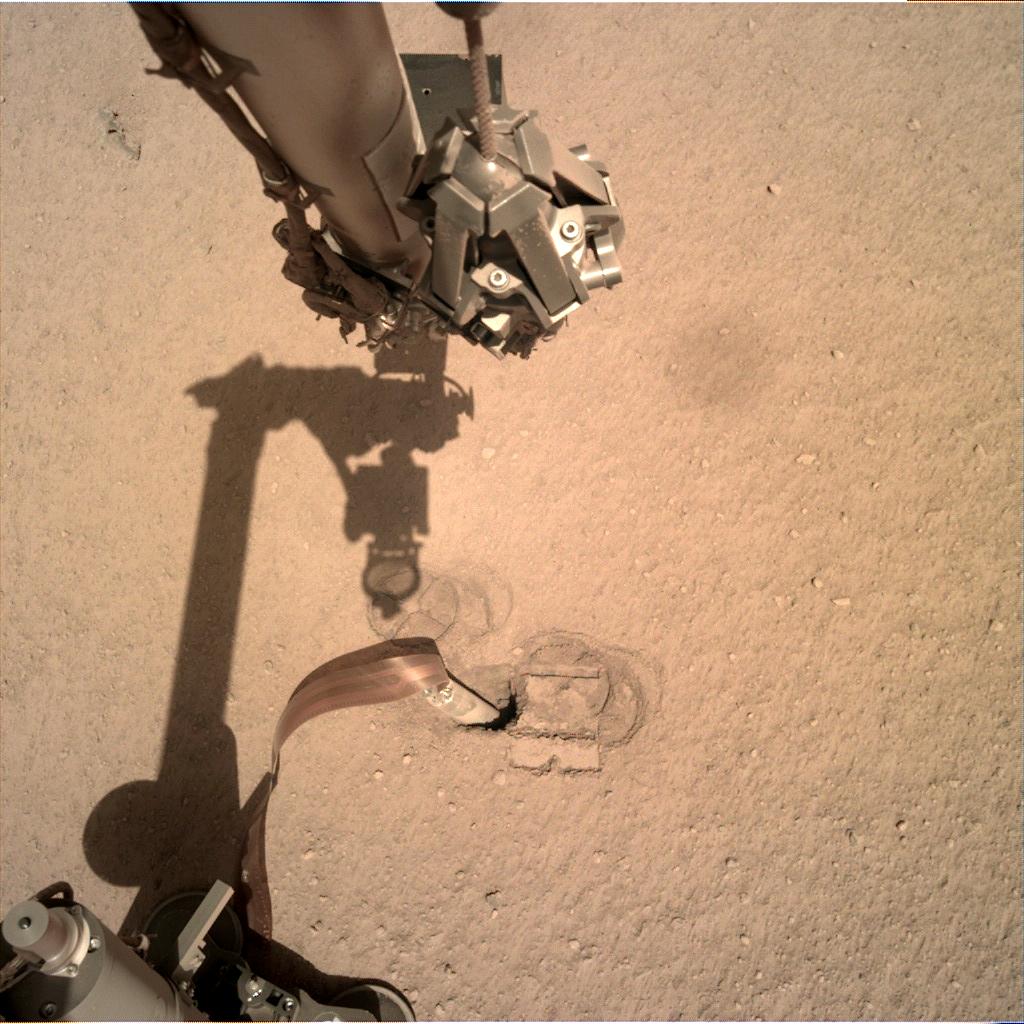 Nasa's Mars lander InSight acquired this image using its Instrument Deployment Camera on Sol 247