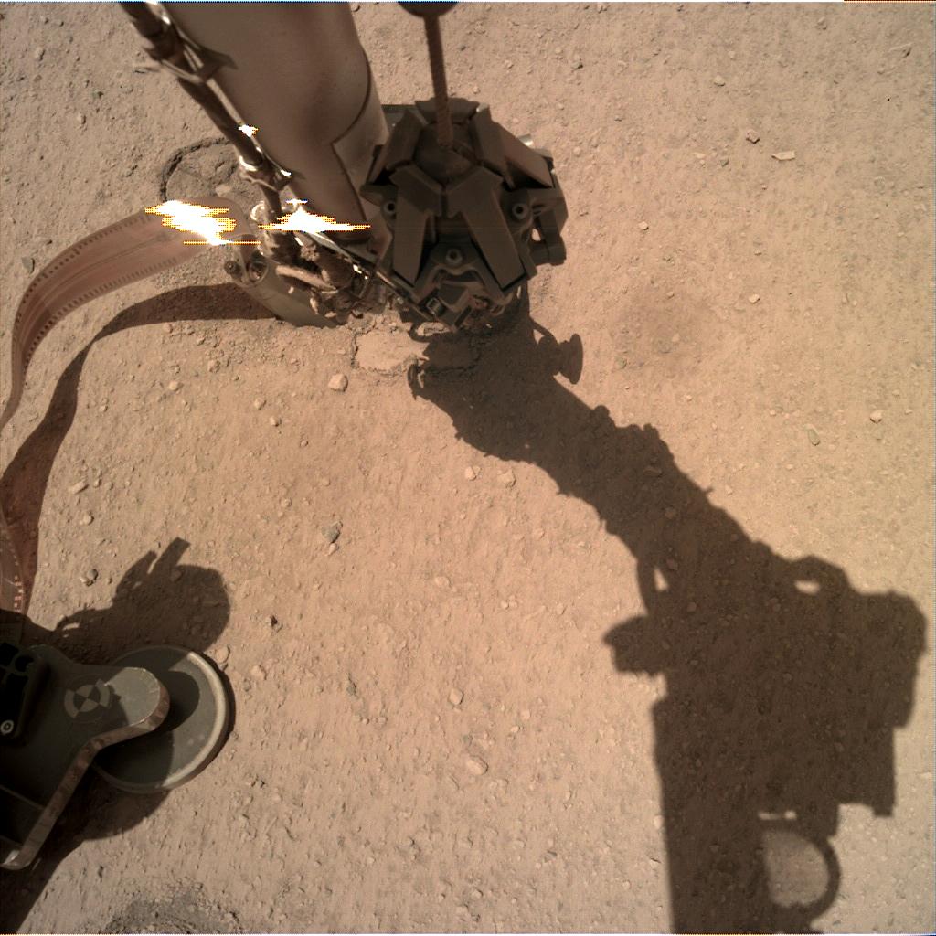 Nasa's Mars lander InSight acquired this image using its Instrument Deployment Camera on Sol 253