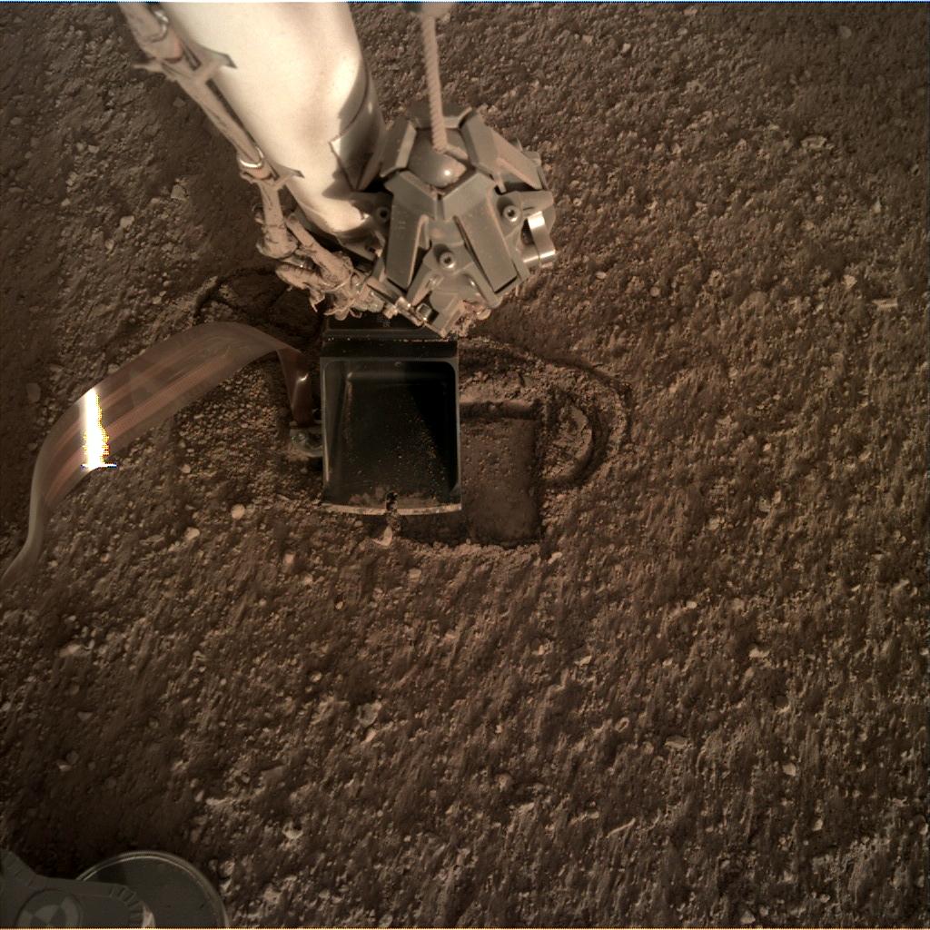 Nasa's Mars lander InSight acquired this image using its Instrument Deployment Camera on Sol 318