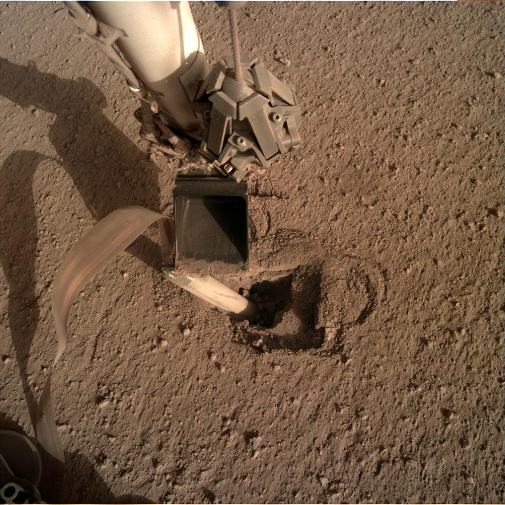 Nasa's Mars lander InSight acquired this image using its Instrument Deployment Camera on Sol 458