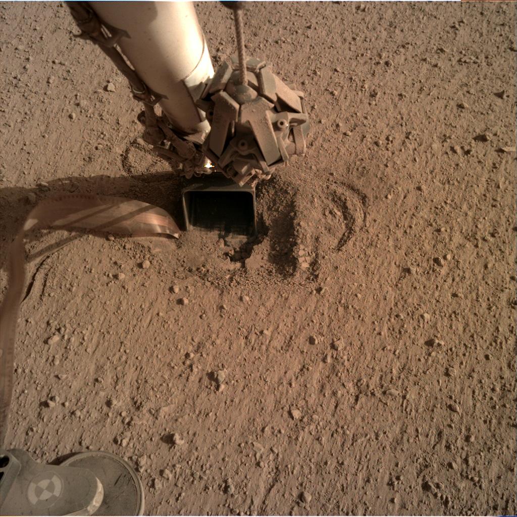 Nasa's Mars lander InSight acquired this image using its Instrument Deployment Camera on Sol 645