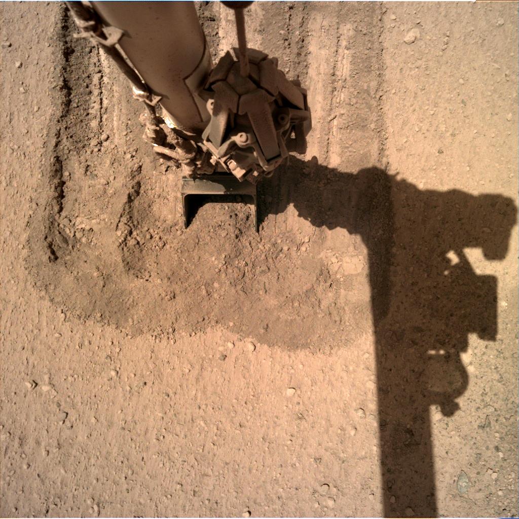 Nasa's Mars lander InSight acquired this image using its Instrument Deployment Camera on Sol 877