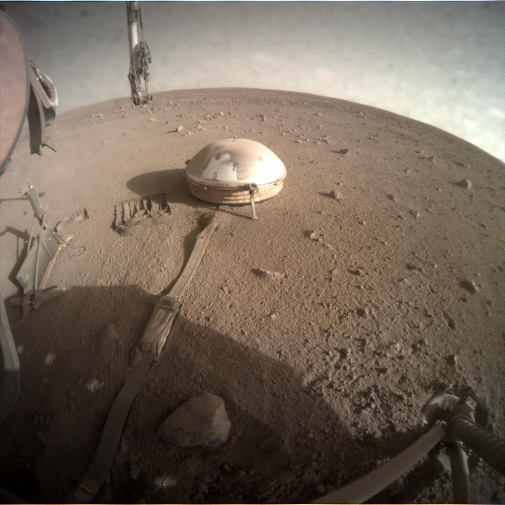 Nasa's Mars lander InSight acquired this image using its Instrument Context Camera on Sol 902