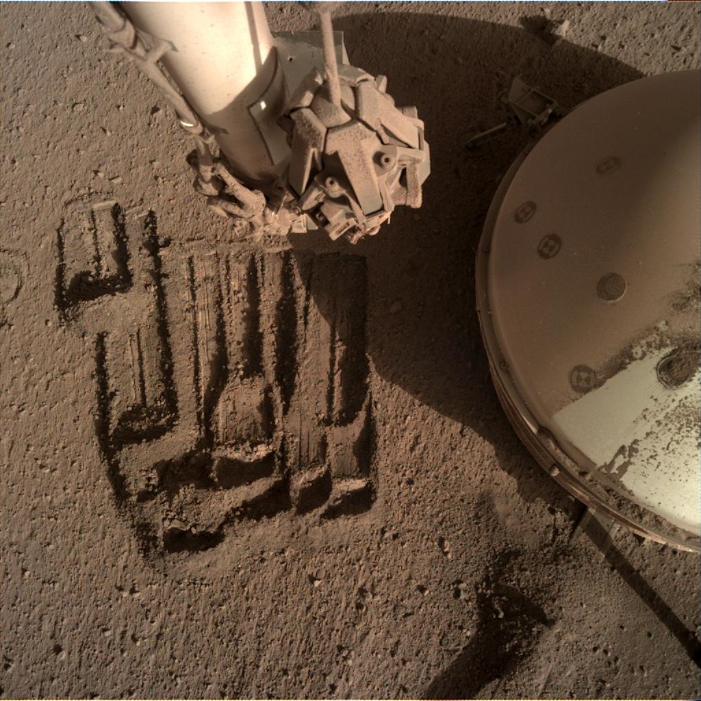 Nasa's Mars lander InSight acquired this image using its Instrument Deployment Camera on Sol 904