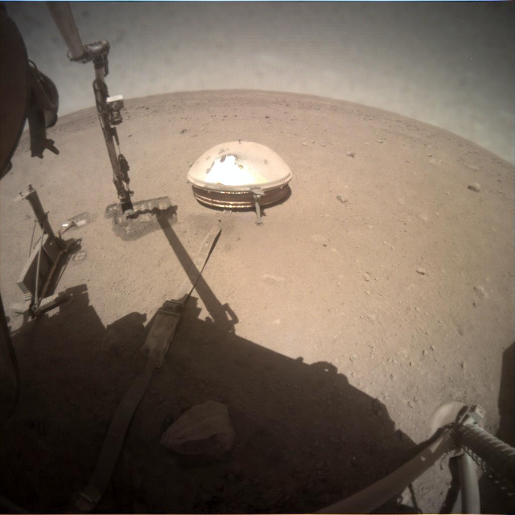 Nasa's Mars lander InSight acquired this image using its Instrument Context Camera on Sol 911