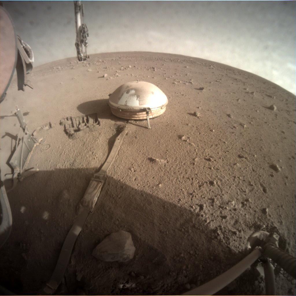 Nasa's Mars lander InSight acquired this image using its Instrument Context Camera on Sol 911