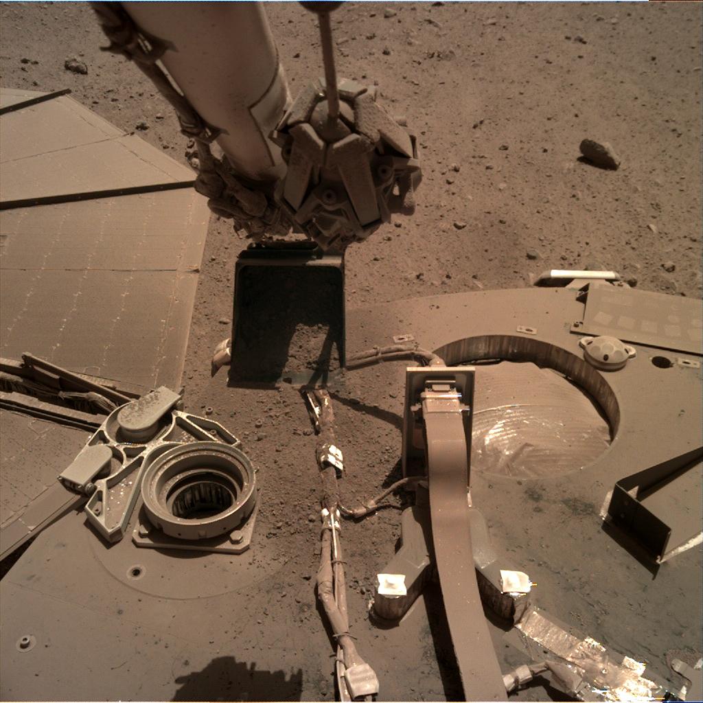 Nasa's Mars lander InSight acquired this image using its Instrument Deployment Camera on Sol 911
