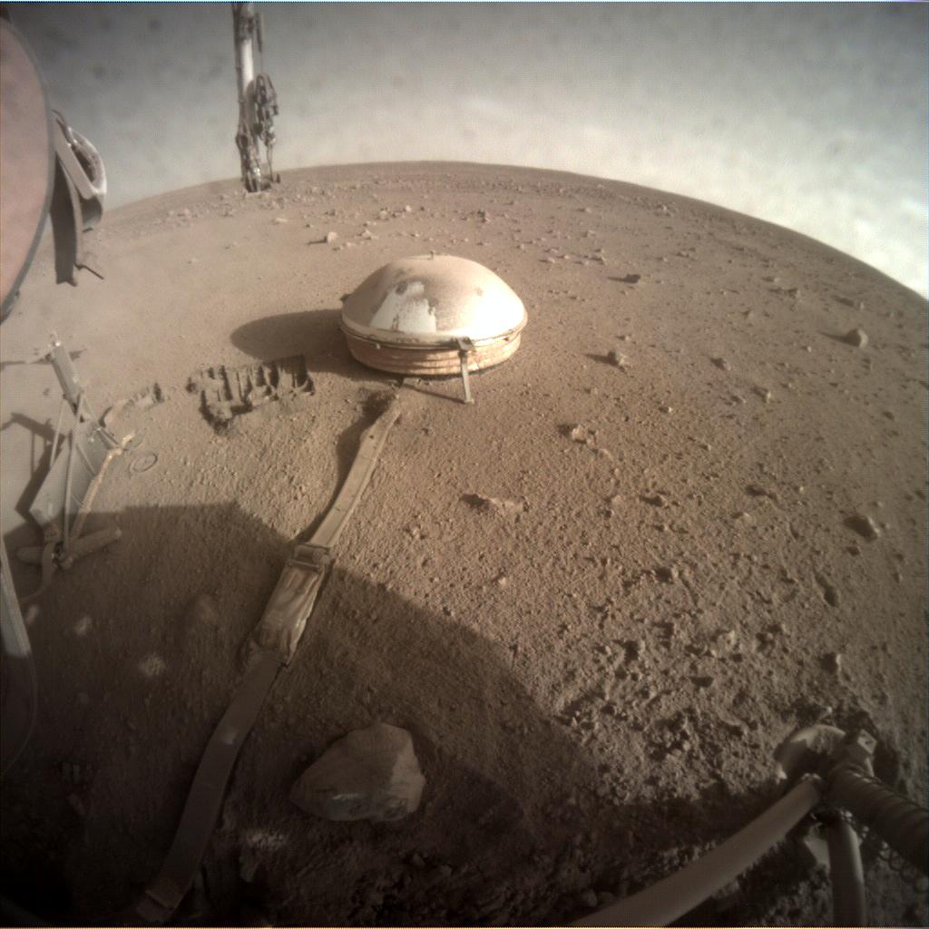 Nasa's Mars lander InSight acquired this image using its Instrument Context Camera on Sol 912