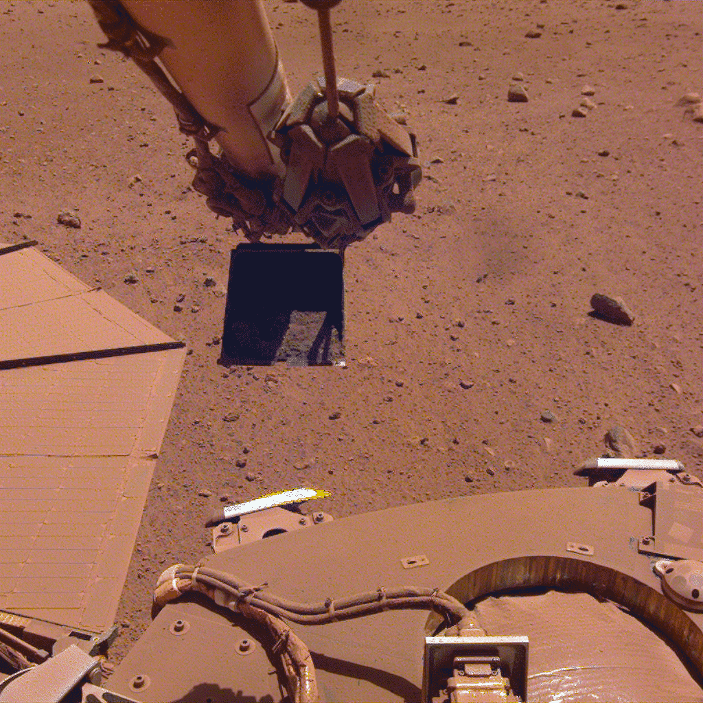 InSight's Robotic Arm Trickles Sand in the Wind