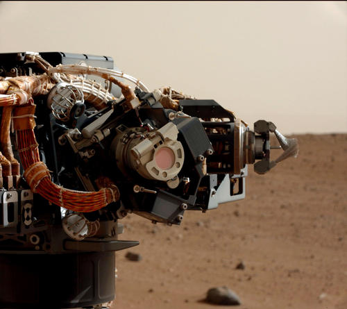 Mastcam image of the Mars Hand Lens Imager (MAHLI) on Curiosity's arm.