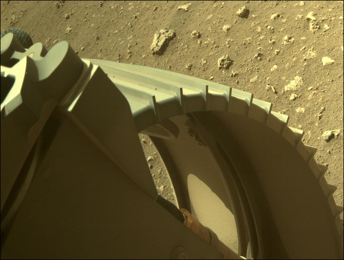 This image was taken by REAR_HAZCAM_LEFT onboard NASA's Mars rover Perseverance on Sol 13