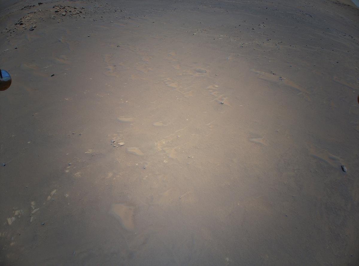 This image was taken by HELI_RTE onboard NASA's Mars rover Perseverance on Sol 76