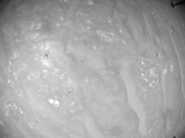 This image was taken by HELI_NAV onboard NASA's Mars rover Perseverance on Sol 388