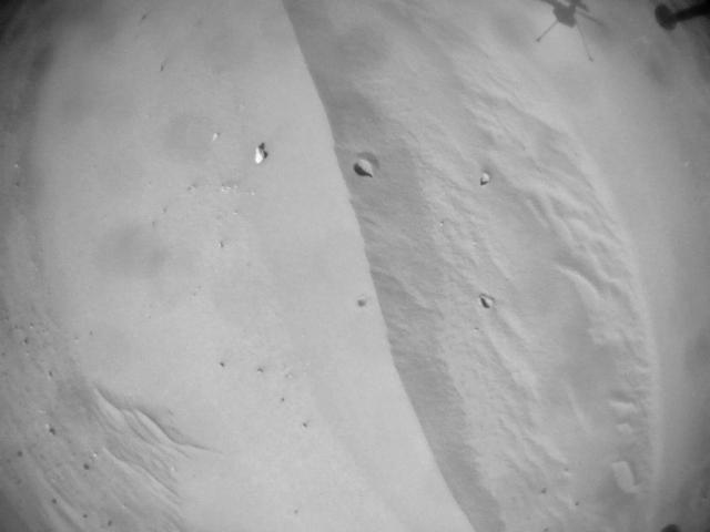 This image was taken by HELI_NAV onboard NASA's Mars rover Perseverance on Sol 667