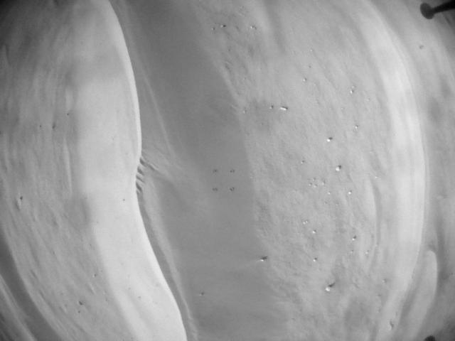 This image was taken by HELI_NAV onboard NASA's Mars rover Perseverance on Sol 673