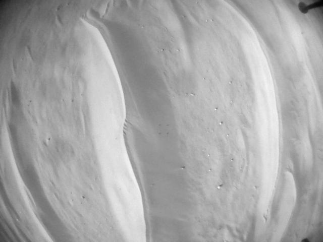 This image was taken by HELI_NAV onboard NASA's Mars rover Perseverance on Sol 673