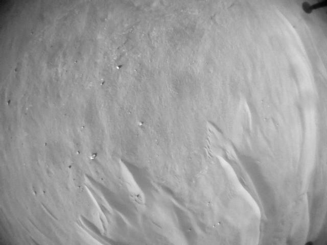 This image was taken by HELI_NAV onboard NASA's Mars rover Perseverance on Sol 673