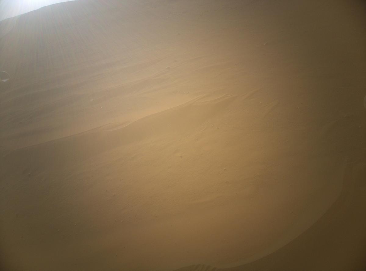 This image was taken by HELI_RTE onboard NASA's Mars rover Perseverance on Sol 673