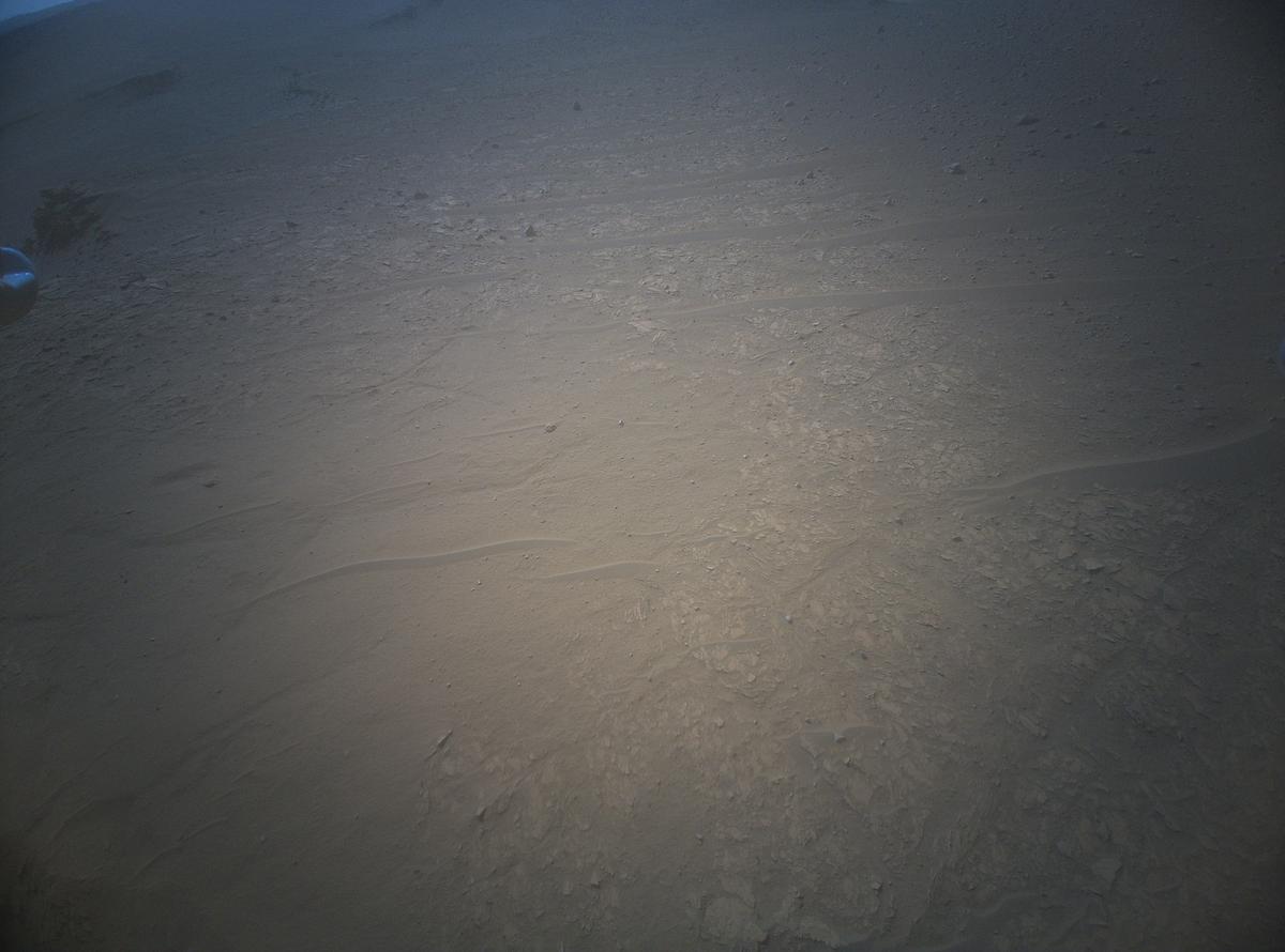 This image was taken by HELI_RTE onboard NASA's Mars rover Perseverance on Sol 689