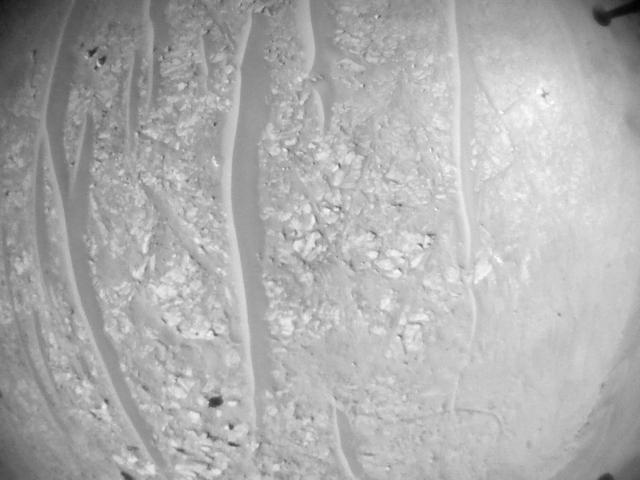 This image was taken by HELI_NAV onboard NASA's Mars rover Perseverance on Sol 697