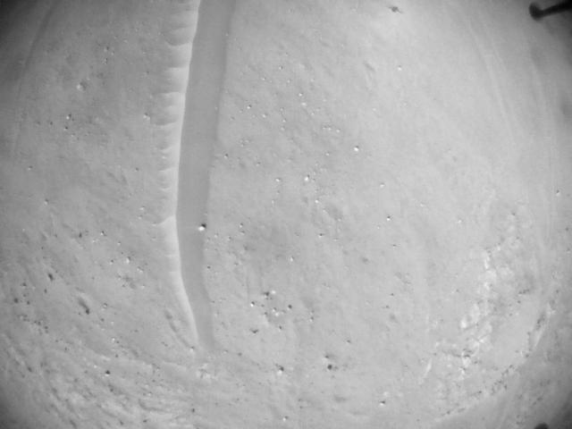 This image was taken by HELI_NAV onboard NASA's Mars rover Perseverance on Sol 697