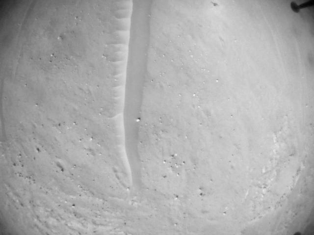 This image was taken by HELI_NAV onboard NASA's Mars rover Perseverance on Sol 697