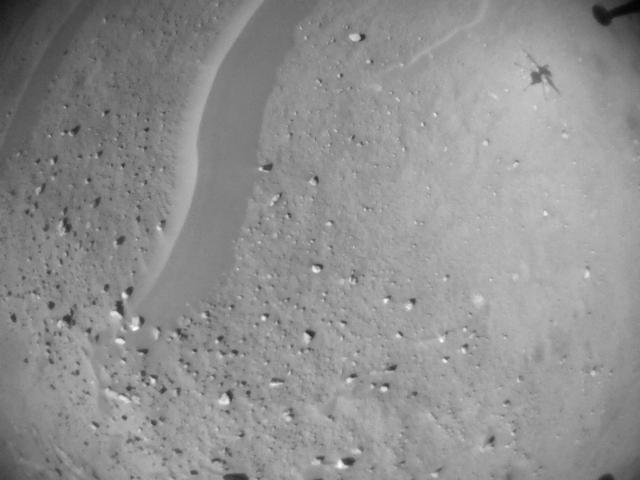 This image was taken by HELI_NAV onboard NASA's Mars rover Perseverance on Sol 697