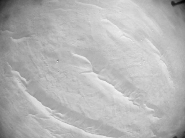 This image was taken by HELI_NAV onboard NASA's Mars rover Perseverance on Sol 711