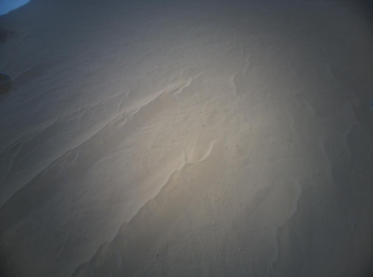This image was taken by HELI_RTE onboard NASA's Mars rover Perseverance on Sol 711
