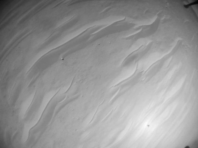 This image was taken by HELI_NAV onboard NASA's Mars rover Perseverance on Sol 717