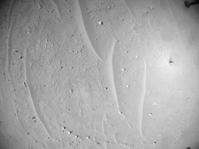 This image was taken by HELI_NAV onboard NASA's Mars rover Perseverance on Sol 741