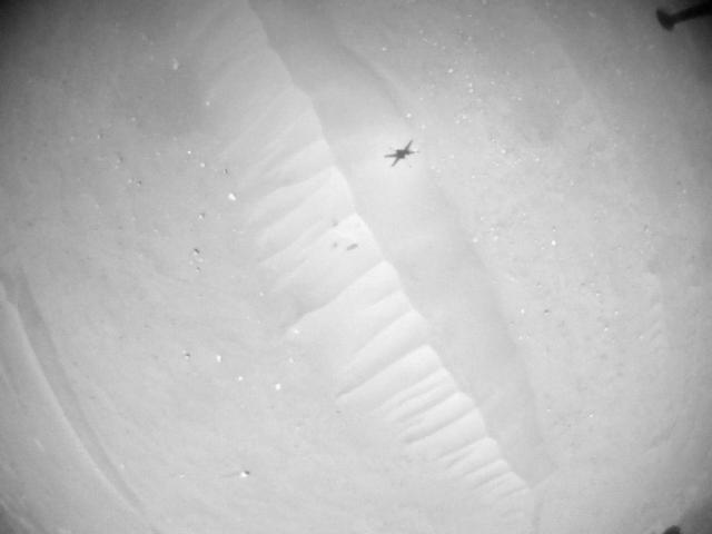 This image was taken by HELI_NAV onboard NASA's Mars rover Perseverance on Sol 902