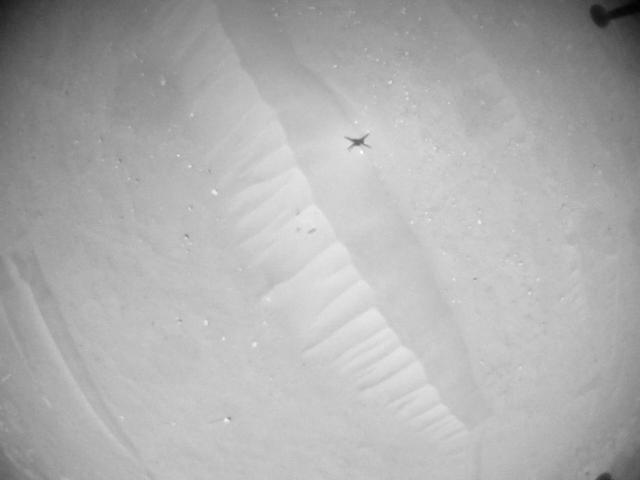 This image was taken by HELI_NAV onboard NASA's Mars rover Perseverance on Sol 902