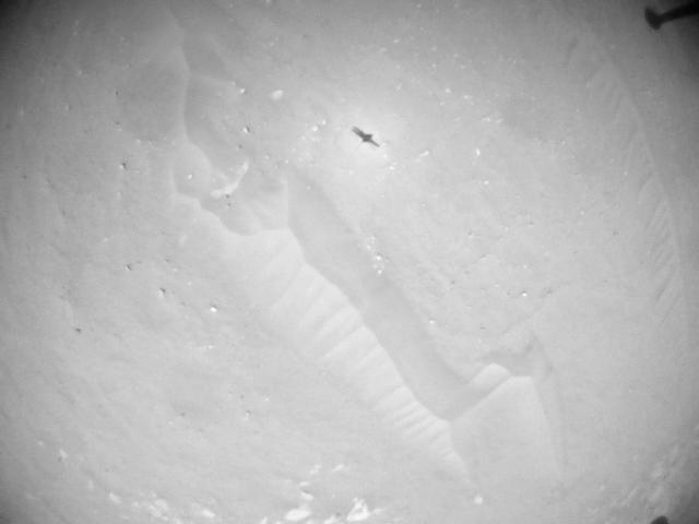 This image was taken by HELI_NAV onboard NASA's Mars rover Perseverance on Sol 902