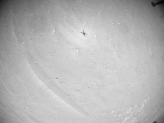 This image was taken by HELI_NAV onboard NASA's Mars rover Perseverance on Sol 902