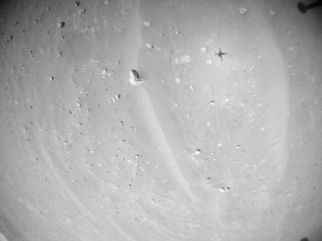 This image was taken by HELI_NAV onboard NASA's Mars rover Perseverance on Sol 902