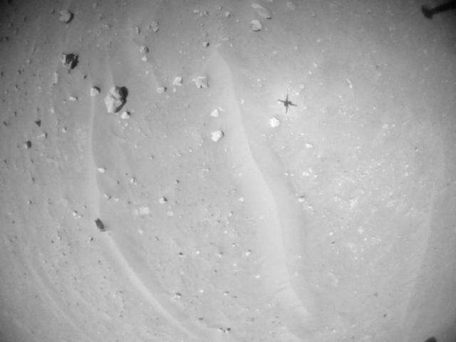 This image was taken by HELI_NAV onboard NASA's Mars rover Perseverance on Sol 902