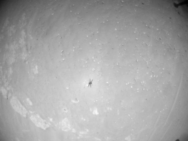 This image was taken by HELI_NAV onboard NASA's Mars rover Perseverance on Sol 910