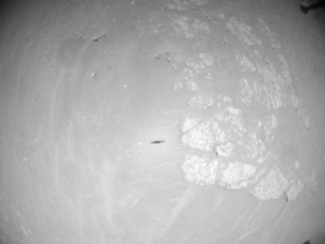 This image was taken by HELI_NAV onboard NASA's Mars rover Perseverance on Sol 910