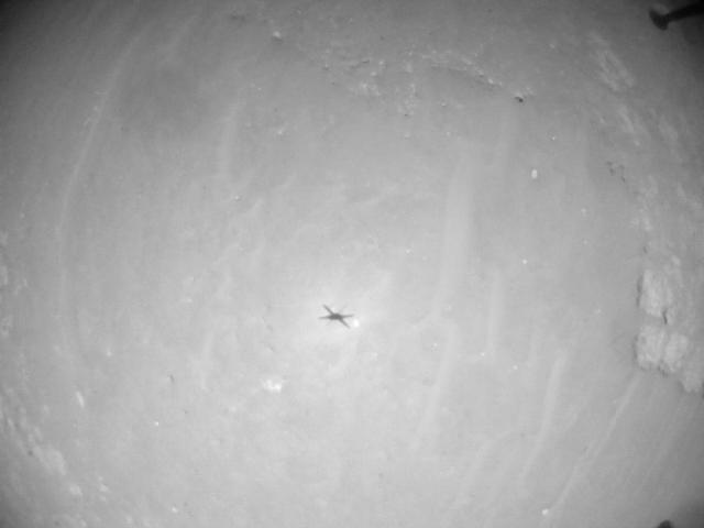 This image was taken by HELI_NAV onboard NASA's Mars rover Perseverance on Sol 910