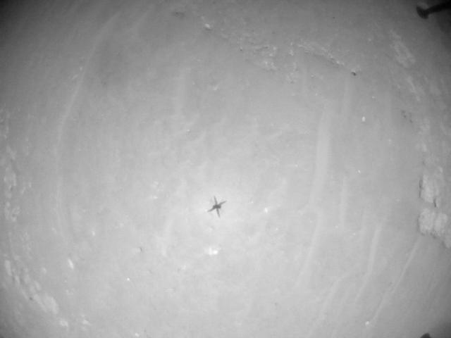 This image was taken by HELI_NAV onboard NASA's Mars rover Perseverance on Sol 910