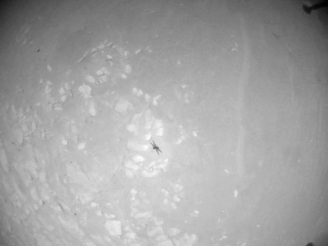 This image was taken by HELI_NAV onboard NASA's Mars rover Perseverance on Sol 910