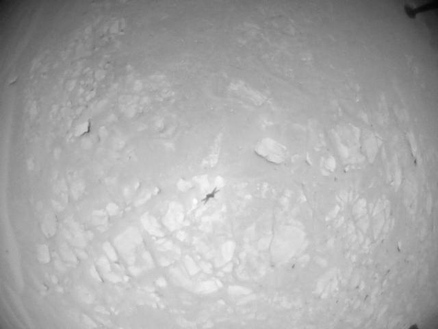 This image was taken by HELI_NAV onboard NASA's Mars rover Perseverance on Sol 910